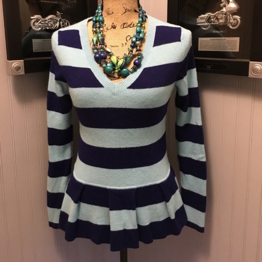 Adorable peplum sweater